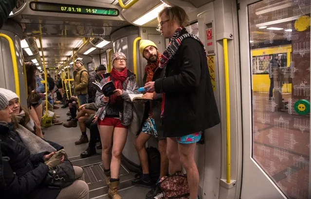 People wearing no pants participate in the worldwide event “No Pants Subway Ride” in Berlin, Germany, 07 January 2018. (Photo by Hayoung Jeon/EPA/EFE/Rex Features/Shutterstock)