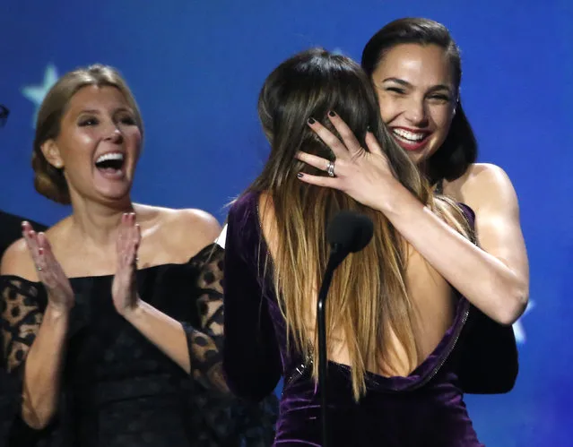 Actress Gal Gadot embraces director Patty Jenkins after Wonder Woman was named Best Action Movie duringThe 23rd Annual Critics' Choice Awards at Barker Hangar on January 11, 2018 in Santa Monica, California. (Photo by Mario Anzuoni/Reuters)