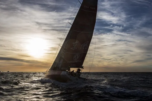 In this handout image provided by the Volvo Ocean Race, Team Dongfeng at the start of Leg 2 from Cape Town to Abu Dhabi on November 19, 2014 in Cape Town, South Africa.(Charlie Shoemaker/Volvo Ocean Race via Getty Images)