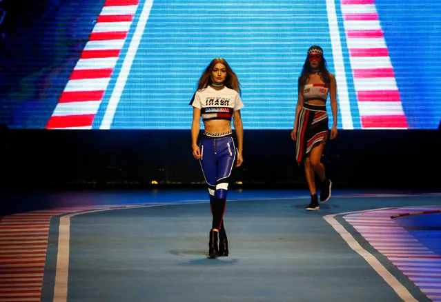 A model presents a creation from the Tommy Hilfiger Autumn/Winter 2018 women collection during Milan Fashion Week in Milan, Italy February 25, 2018. (Photo by Tony Gentile/Reuters)