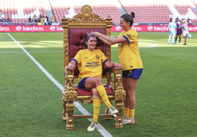 The Utah Royals defender Kaleigh Riehl was crowned player of the game by the forward Paige Monaghan after their 2-0 win over Houston Dash in the US National Women’s Soccer League on September 14, 2025. (Photo by Rob Gray/Reuters)
