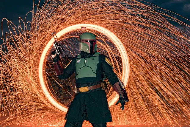 Star Wars cosplayer Shawn Richter as Boba Fett poses for photos at Buttercup Sand Dunes on January 15, 2022 in Winterhaven, California. Buttercup San Dunes was the location of several iconic scenes filmed for Star Wars: Return of the Jedi. (Photo by Daniel Knighton/Getty Images)