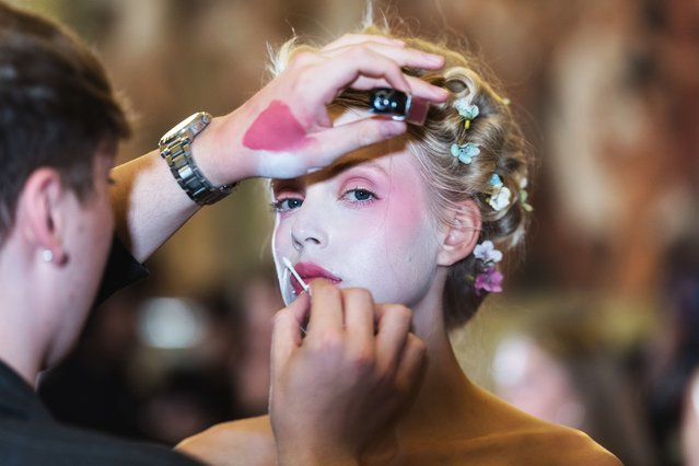 A model has her make-up applied backstage ahead of Aadnevik Spring/ Summer 2026 show a la memoire de 'Marie Antoinette' the last Queen at The Royal Horseguards Hotel as part of London Fashion Week in London, United Kingdom on September 21, 2025. (Photo by Wiktor Szymanowicz/Anadolu via Getty Images)
