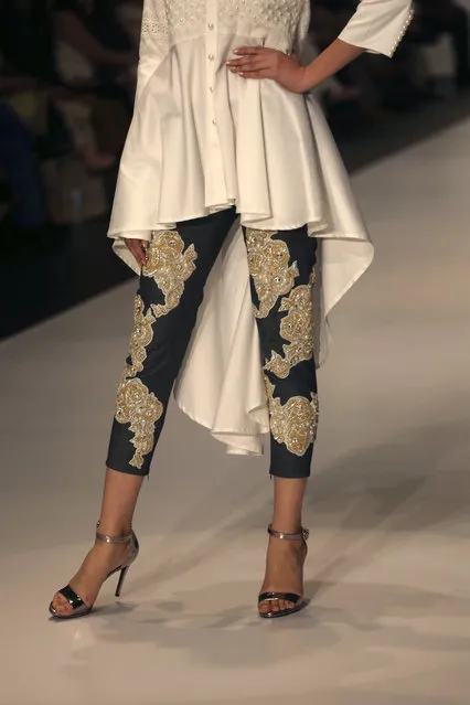 A model presents a creation by Pakistani designer Shahla Rahman during the Hum Fashion Week in Karachi, Pakistan, Thursday, March 29, 2018. (Photo by Shakil Adil/AP Photo)