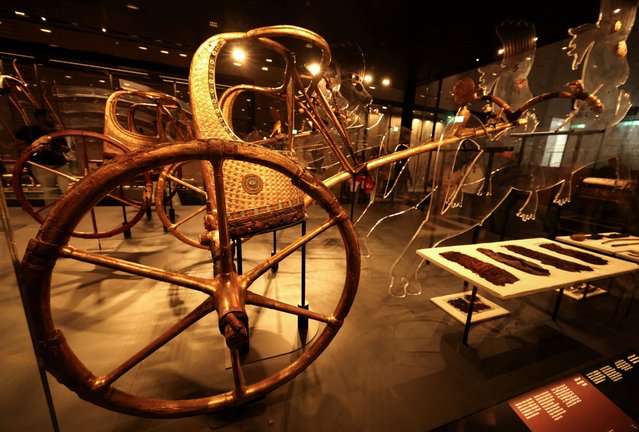 Chariots from the collection of the Egyptian king Tutankhamun are on display during the first day for visitors, after the official opening of the Grand Egyptian Museum (GEM), near the Giza pyramid complex, in Giza, Egypt, on November 4, 2025. (Photo by Mohamed Abd El Ghany/Reuters)