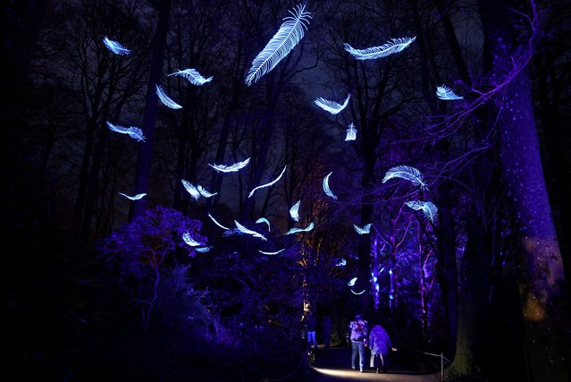 Visitors view a lighting display which forms part of the “Christmas at Stourhead” seasonal illuminated trail at Stourhead house and gardens near Stourton, Britain, on December 17, 2024. (Photo by Toby Melville/Reuters)