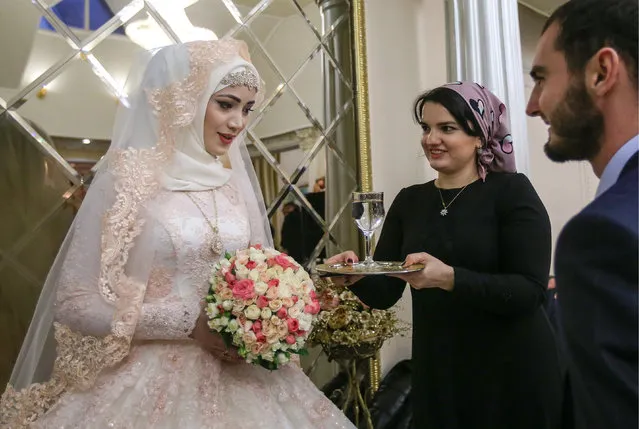 The bride during a traditional Chechen wedding ceremony in Grozny, Chechnya, Russia on November 24, 2016. (Photo by Valery Sharifulin/TASS)