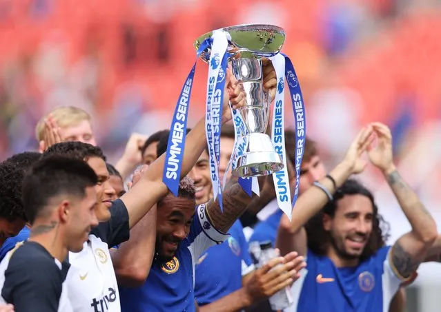 Reece James of Chelsea lifts the Summer Series trophy after their victory in the Premier League Summer Series match between Chelsea FC and Fulham FC at FedExField on July 30, 2023 in Landover, Maryland. (Photo by Mike Stobe/Getty Images)