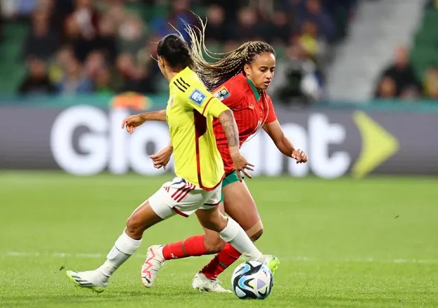 Fatima Tagnaout of Morocco takes on Carolina Arias of Colombia during the FIFA Women's World Cup Australia & New Zealand 2023 Group H match between Morocco and Colombia at Perth Rectangular Stadium on August 03, 2023 in Perth, Australia. (Photo by Luisa Gonzalez/Reuters)