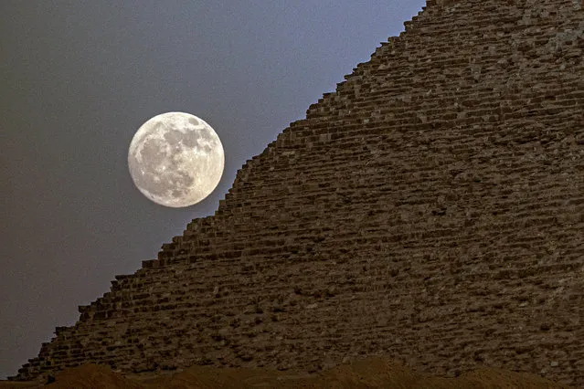 A supermoon is seen near the Great Pyramid of Giza, Egypt, on July 2, 2023. (Photo by Xinhua News Agency/Rex Features/Shutterstock)