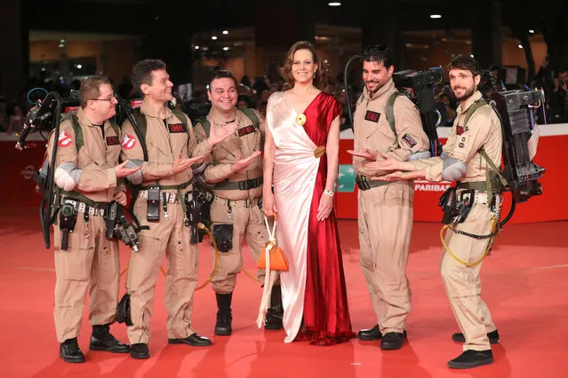 Ghostbusters cosplayers and Sigourney Weaver pose on the red carpet during the 13th Rome Film Fest at Auditorium Parco Della Musica on October 24, 2018 in Rome, Italy. (Photo by Vittorio Zunino Celotto/Getty Images)