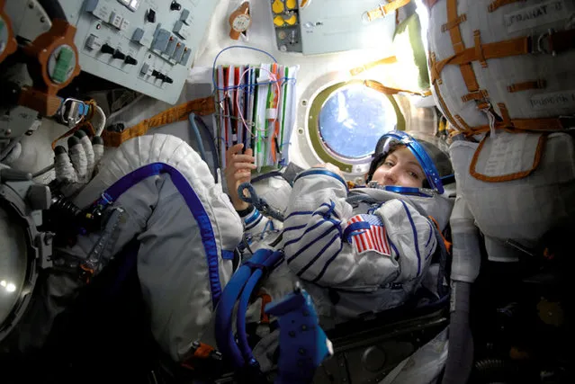 Space tourist Anousheh Ansari is photographed in her seat on board the Soyuz TMA-9 spacecraft while enroute to the International Space Station, September 2006. (Photo by Reuters/NASA)