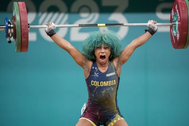 Colombia's Concepcion Usuga competes in women's weightlifting 59Kg at the Pan American Games in Santiago, Chile, Sunday, October 22, 2023. (Photo by Moises Castillo/AP Photo)