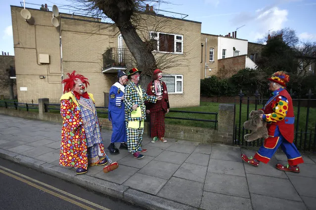 Clowns arrive at the All Saints Church before the Grimaldi clown service in Dalston, north London, February 7, 2016. (Photo by Peter Nicholls/Reuters)