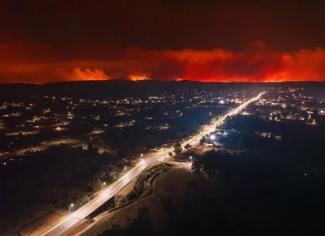Bushfires seen in the distance surrounding the northern New South Wales town of Tenterfield, Australia on November 1, 2023. (Photo by Reuters/Stringer)