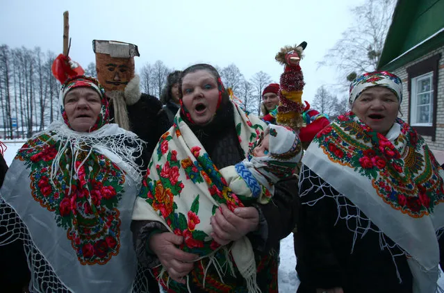 People celebrate the pagan rite called “Kolyadki” and mark the New Year, according to the Julian calendar on January 13, in the village of Vosava, Belarus January 13, 2017. (Photo by Vasily Fedosenko/Reuters)