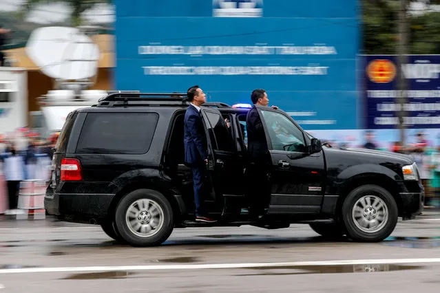 A slow shutter image shows North Korean bodyguards in the motorcade following their leader Kim Jong-un as he makes his way from in Dong Dang to Hanoi ahead of the second US-North Korea summit, Vietnam, 26 February 2019. The second meeting of the US President and the North Korean leader, running from 27 to 28 February 2019, focuses on furthering steps towards achieving peace and complete denuclearization of the Korean peninsula. (Photo by Wallace Woon/EPA/EFE)