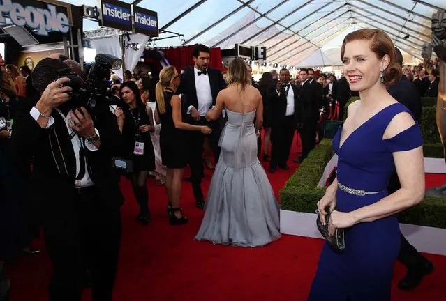 Amy Adams arrives at the 20th annual Screen Actors Guild Awards at the Shrine Auditorium. (Photo by Matt Sayles/AP Photo/Invision)