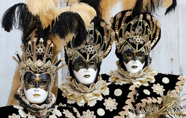 Masked revellers take part in the Carnival in Venice, Italy, March 2, 2019. (Photo by Yves Herman/Reuters)