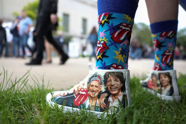 Mick Jagger and Keith Richards are seen on the shoes of Andrew Weaseman, a fan who traveled from Nashville, Tennessee for the show, ahead of the kick-off show of the Rolling Stones' “No Filter” tour at Soldier Field in Chicago, Illinois, U.S. June 21, 2019. (Photo by Daniel Acker/Reuters)