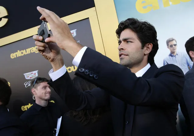 Adrian Grenier seen at Warner Bros. Premiere of "Entourage" held at Regency Village Theatre on Monday, June 1, 2015, in Westwood, Calif. (Photo by Eric Charbonneau/Invision for Warner Bros./AP Images)