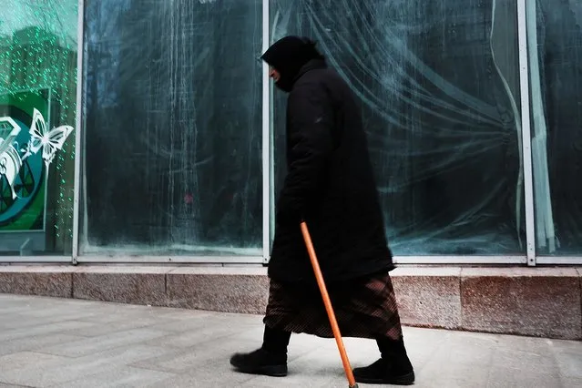 A woman walks through the center of Moscow on March 3, 2017 in Moscow, Russia. (Photo by Spencer Platt/Getty Images)