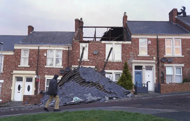 A house in Gateshead, north east England, Sunday January 30, 2022, which lost its roof after strong winds from Storm Malik battered northern parts of the UK PA Photo. The Met Office have said that another blast of severe strong winds is set to hit parts of the UK. (Photo by Owen Humphreys/PA Wire via AP Photo)
