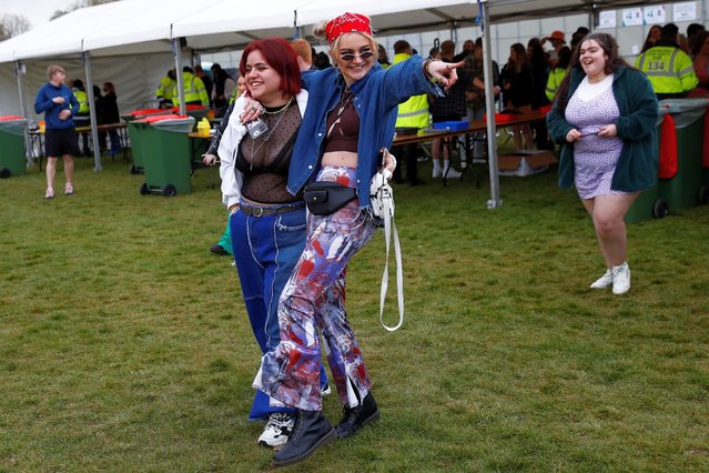 Women react during a test music festival as part of a national research programme assessing the risk of COVID-19 transmission in Liverpool, on May 2, 2021. (Photo by Jason Cairnduff /Reuters)
