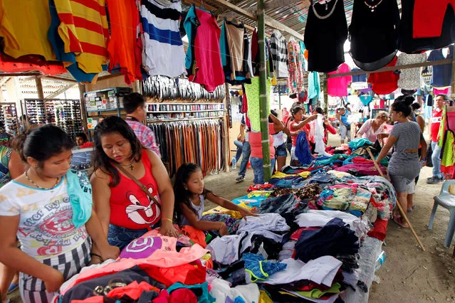 A vendor displays her wares at a market near an earthquake-affected area in Manta, Ecuador May 7, 2016. (Photo by Guillermo Granja/Reuters)
