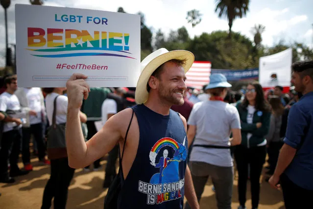 Supporter Koelen Andrews, 34, waits for U.S. Democratic presidential candidate Bernie Sanders to speak in East Los Angeles, California, U.S. May 23, 2016. (Photo by Lucy Nicholson/Reuters)