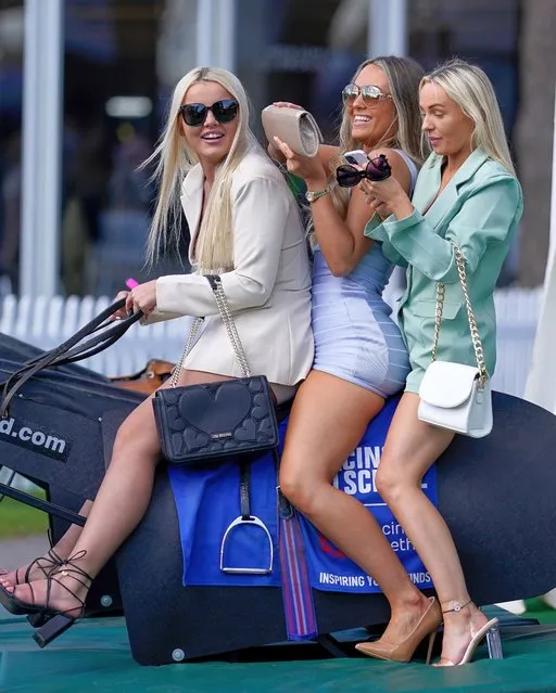 Early arrivals on “Ladies Day” at Aintree Racecourse on April 08, 2022 in Liverpool, England. (Photo by Alan Crowhurst/Getty Images)
