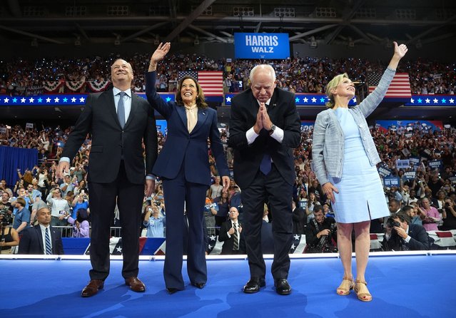 (L-R) Second gentleman Doug Emhoff, Democratic presidential candidate, U.S. Vice President Kamala Harris, Democratic vice presidential candidate Minnesota Gov. Tim Walz and his wife Gwen Walz greet supporters during a campaign rally at Girard College on August 6, 2024 in Philadelphia, Pennsylvania. Harris ended weeks of speculation about who her running mate would be, selecting the 60-year-old midwestern governor over other candidates. (Photo by Andrew Harnik/Getty Images)