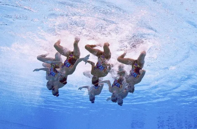 Members of Team USA are seen underwater as they perform in the synchronised swimming team free routine preliminary at the Aquatics World Championships in Kazan, Russia July 28, 2015. (Photo by Michael Dalder/Reuters)