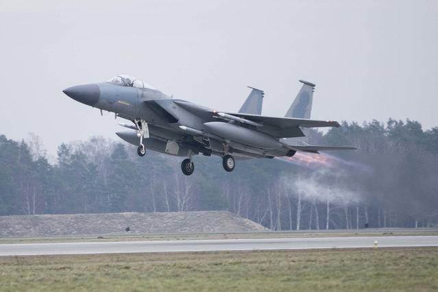 In this image provided by the U.S. Air Force, a U.S. Air Force F-15C Eagle assigned to the 493rd Fighter Squadron, Royal Air Force (RAF) Lakenheath, takes off in support of North Atlantic Treaty Organization enhanced air policing missions with the Polish Air Force at Lask Air Base, Poland, February 15, 2022. Russia's attack on Ukraine's Zaporizhzhia nuclear power plant has renewed calls for NATO to impose a no-fly zone over Ukraine, despite the repeated rejection of the idea by western leaders concerned about triggering a wider war in Europe. (Photo by Tech. Sgt. Jacob Albers/U.S. Air Force via AP Photo)