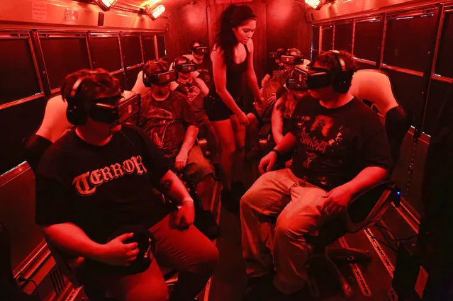 People watching the It: Float movie during a cinematic virtual reality experience in New Jersey, US on August 19, 2017. (Photo by MediaPunch/Rex Features/Shutterstock)