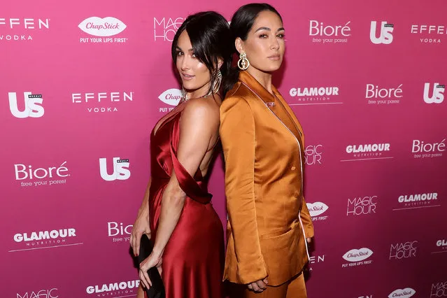 WWE twins Nikki Bella and Brie Bella attend the 2018 US Weekly Most Stylish New Yorkers at Magic Hour Rooftop Bar & Lounge on September 12, 2018 in New York City. (Photo by Taylor Hill/WireImage)