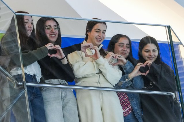 Five former Israeli hostages recently released from Hamas captivity, from right, Daniella Gilboa, Liri Albag, Agam Berger, Karina Ariev and Naama Levy listen to a concert at Beilinson hospital, where they are recovering, in Petah Tikva, Israel, Tuesday, February 4, 2025. (Photo by Ohad Zwigenberg/AP Photo)