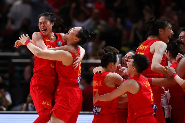 Team China celebrates during the 2022 FIBA Women's Basketball World Cup Semi Final match between Australia and China at Sydney Superdome, on September 30, 2022, in Sydney, Australia. (Photo by Kelly Defina/Getty Images)