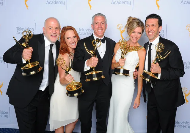 Chuck Saftler, from left, Maureen Timpa, Brian Katkin, Tava Smiley, and Adam Lewinson, winners of the award for outstanding short format nonfiction program for “A Tribute to Mel Brooks”, pose for a portrait at the Television Academy's Creative Arts Emmy Awards at Microsoft Theater on Saturday, September 12, 2015, in Los Angeles. (Photo by Vince Bucci/Invision for the Television Academy/AP Images)