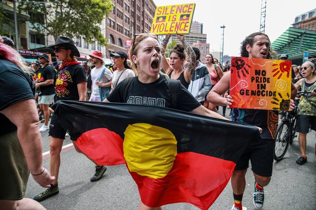 Demonstrators shout slogan as they march towards Victoria Park during an Invasion Day protest on January 26, 2024 in Sydney, Australia. Australia Day, formerly known as Foundation Day, is the official national day of Australia and is celebrated annually on January 26 to commemorate the arrival of the First Fleet to Sydney in 1788. Many indigenous Australians refer to the day as Invasion Day and there is a growing movement to change the date to one which can be celebrated by all Australians. In 2024, supermarket Chains Woolworths and Aldi announced that they would stop stocking themed merchandise for the day, drawing a political backlash from opposition leader Peter Dutton. (Photo by Roni Bintang/Getty Images)