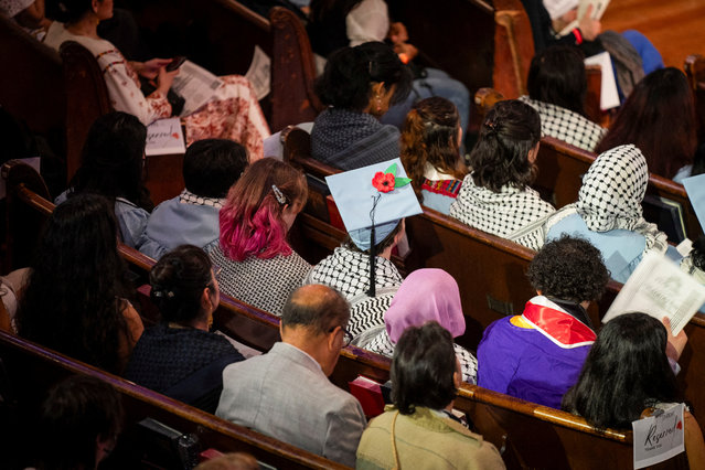 Students attend the People's Graduation, hosted for Mahmoud Khalil and other students unable to participate in Columbia and New York University's commencement ceremony, at the Cathedral of St. John the Divine in New York City on May 19, 2025. (Photo by Angelina Katsanis/Reuters)
