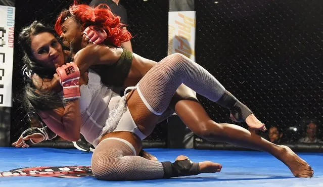 Fighters Sheila “Crash” Cardinal (L) and MaiNe “Main Event” Morgan compete during “Lingerie Fighting Championships 21: Naughty 'n Nice” at the Robinson Rancheria Resort & Casino on June 18, 2016 in Nice, California. Morgan won the bout. (Photo by Ethan Miller/Getty Images for LFC)