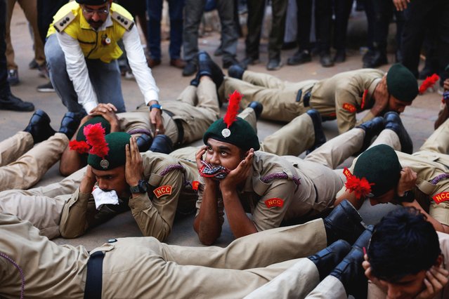 Cadets of National Cadet Corps (NCC) participate in a civil defence mock drill on street in Ahmedabad, India on May 31, 2025. (Photo by Amit Dave/Reuters)