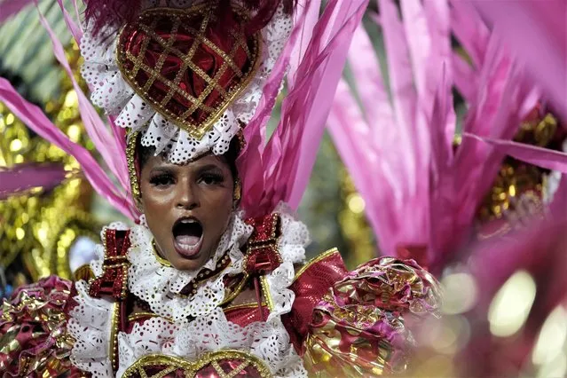 Performer from the Salgueiro samba school parades during Carnival celebrations at the Sambadrome in Rio de Janeiro, Brazil, Monday, February 20, 2023. (Photo by Silvia Izquierdo/AP Photo)
