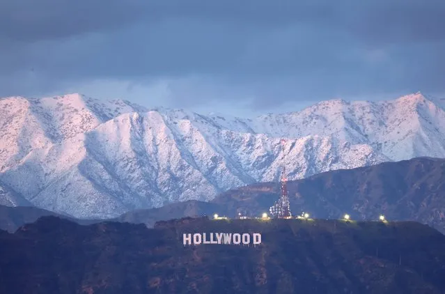 The Hollywood sign stands in front of snow-covered mountains after another winter storm hit Southern California on March 01, 2023 in Los Angeles, California. The final in a series of winter storms in the Los Angeles region brought snow levels to as low as 1,000 feet in some places while further boosting the snowpack. California’s snowpack level stands at 189 percent of the average for March 1, according to the California Department of Water Resources. California Governor Gavin Newsom has declared a state of emergency due to winter storms for 13 counties including Los Angeles County. (Photo by Mario Tama/Getty Images)
