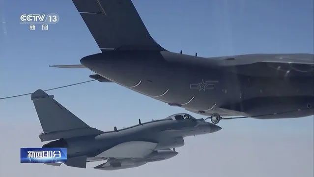 In this image taken from video footage run Saturday, April 8, 2023 by China's CCTV, a Chinese fighter jet performs an mid-air refueling maneuver at an unspecified location. The Chinese military announced exercises around Taiwan on Saturday in a new act of retaliation for a meeting between the U.S. House of Representatives speaker and the president of the self-ruled island democracy claimed by Beijing as part of its territory. (Photo by CCTV via AP Photo)
