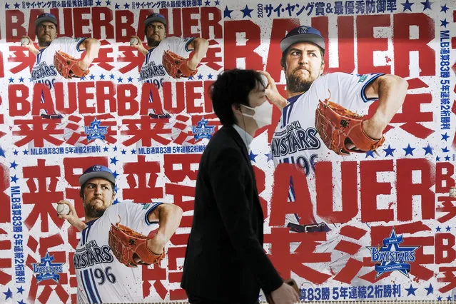Posters of Trevor Bauer who's pitching for the Yokohama BayStars are placed at the pathway of a train station on Tuesday, May 2, 2023, in Yokohama near Tokyo. Bauer will pitch his first official game for the Yokohama DeNA BayStars on Wednesday and, to promote the start, a local department store is to unveil a seven-story poster of the former Cy Young winner on the building's facade. (Photo by Eugene Hoshiko/AP Photo)