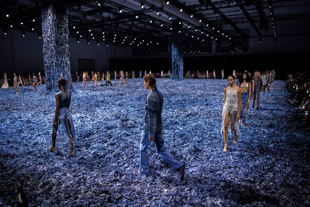 Models walk along a floor covered in denim scraps during the Diesel show at Milan Fashion Week on Saturday, September 21, 2024. (Photo by SGP/Sipa USA)