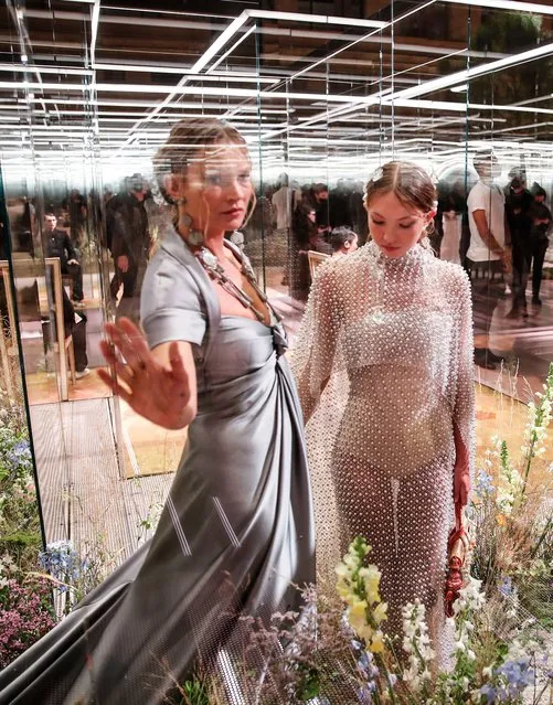 English model Kate Moss, left, and her daughter Lila Grace Moss wear creations for Fendi's Spring-Summer 2021 Haute Couture fashion collection presented Wednesday, January 27, 2021 in Paris. (Photo by Francois Mori/AP Photo)