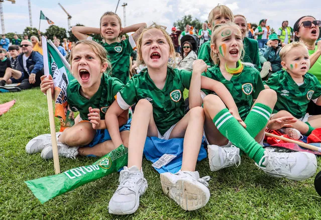 Ireland fans Frankie McCabe, Evie Mooney, Penny McCabe, Brooke Kelleher, Seth Mooney and Blake Kelleher watch the 2023 Fifa Women's World Cup Group B Australia vs Republic of Ireland match at the watch party in Ringsend, Ireland on July 20, 2023. (Photo by Tom Maher/Inpho)